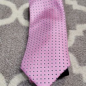 A pink with blue squares neck tie